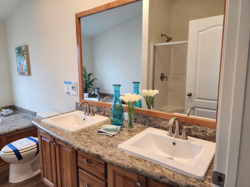 Dual sinks and a large mirror.