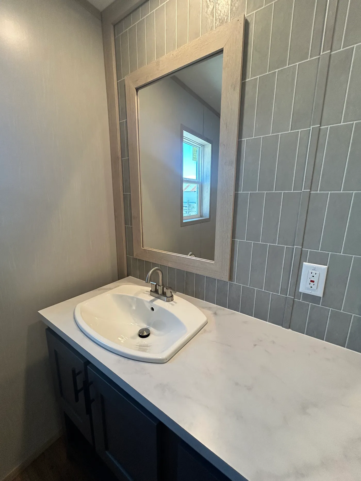 One of the dual sinks featured in the main bathroom. 