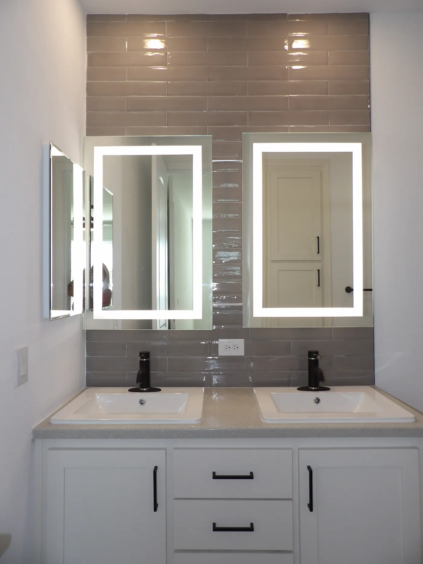 Raised Dual Vanity with back-lit Mirrors