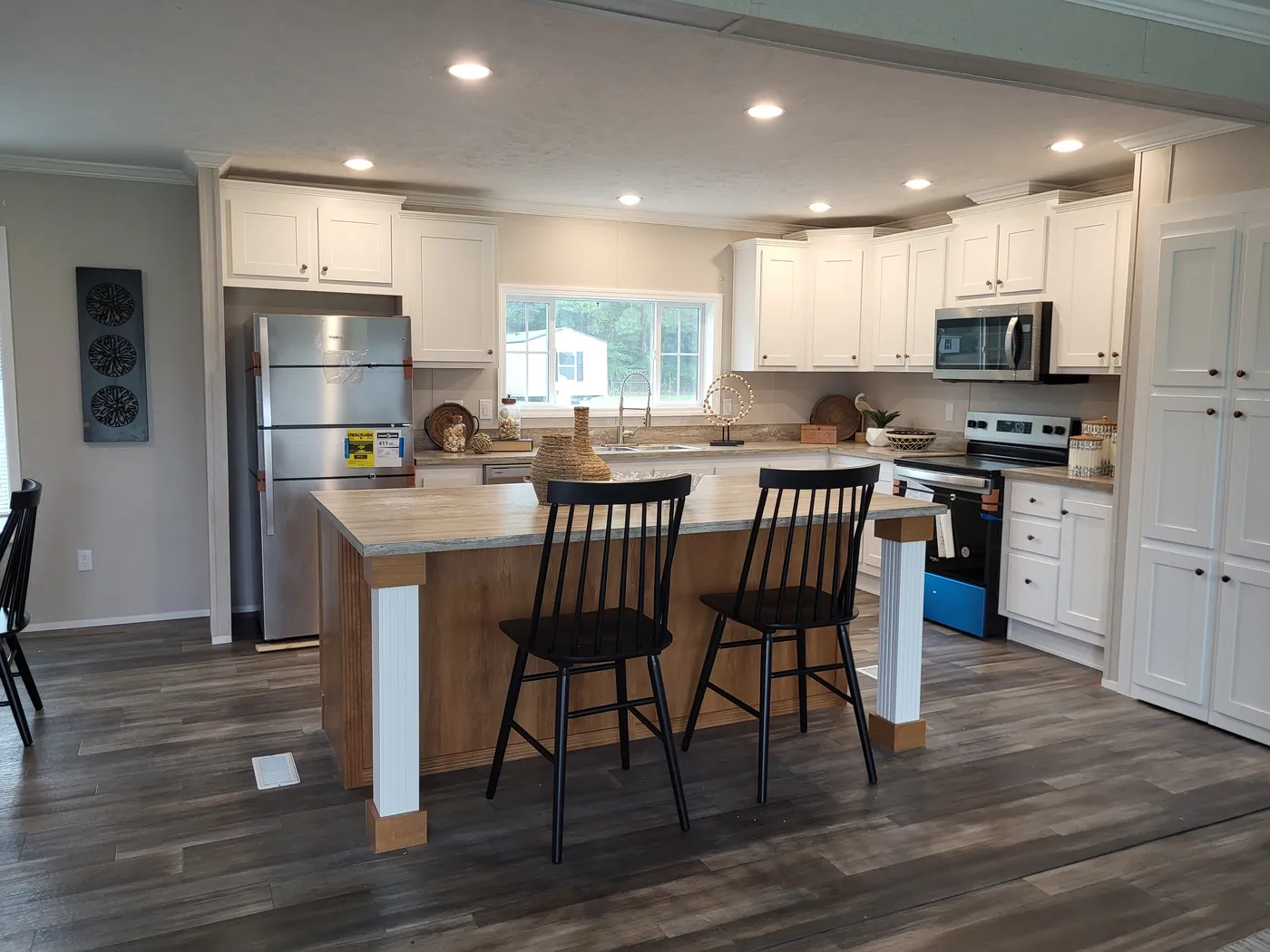 Stainless steel appliances, hidden pantry