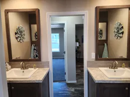 Double and separate sinks in guest bathroom