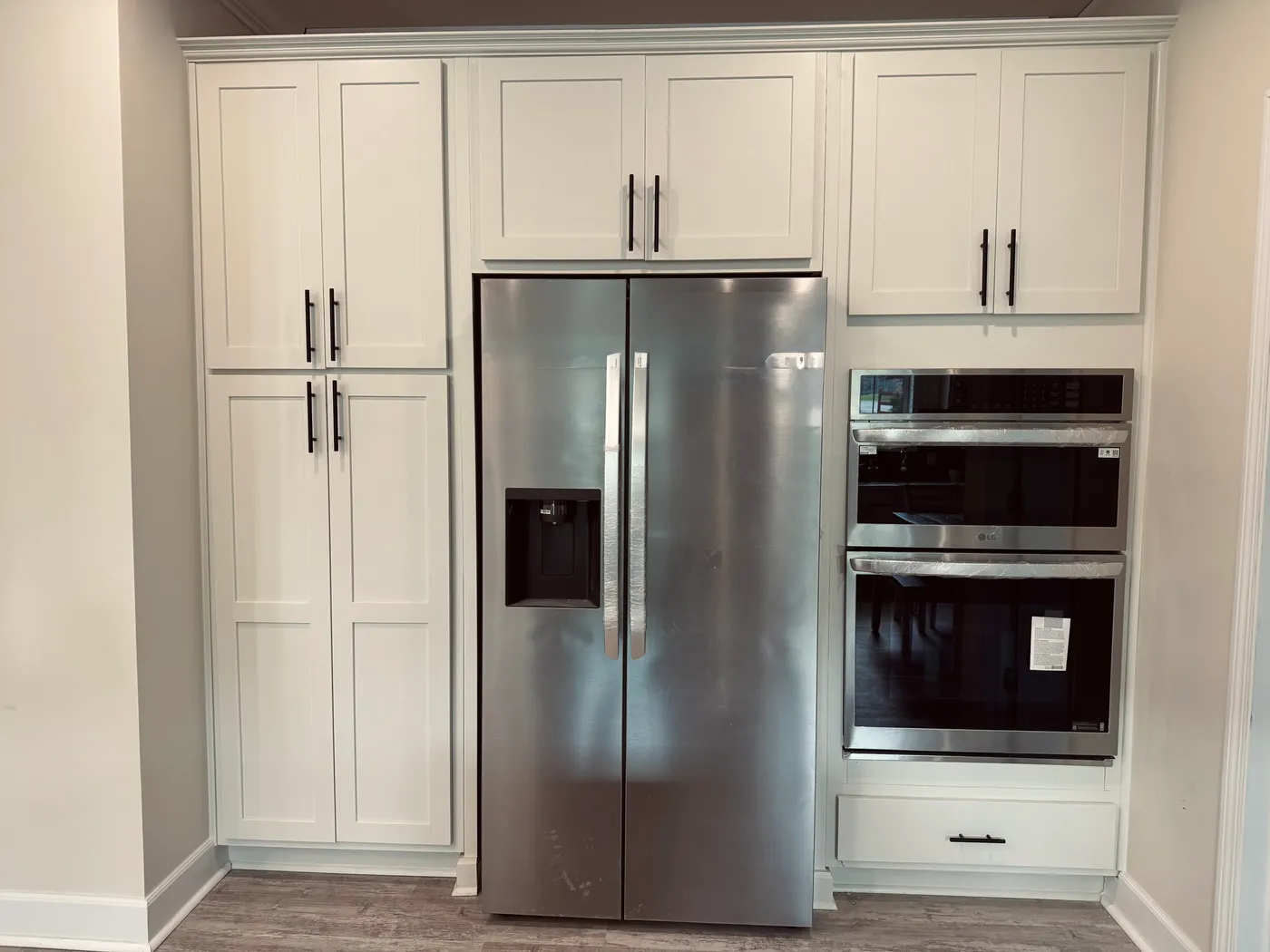 Built in cabinetry around your top of the line LG Stainless Appliances.