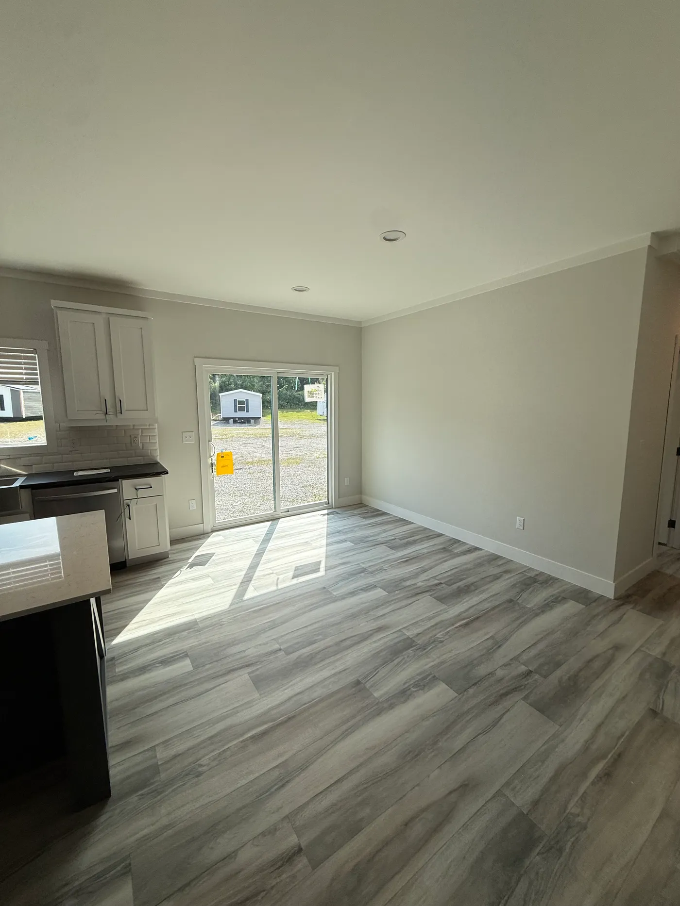 DINING AREA WITH SLIDING GLASS DOOR