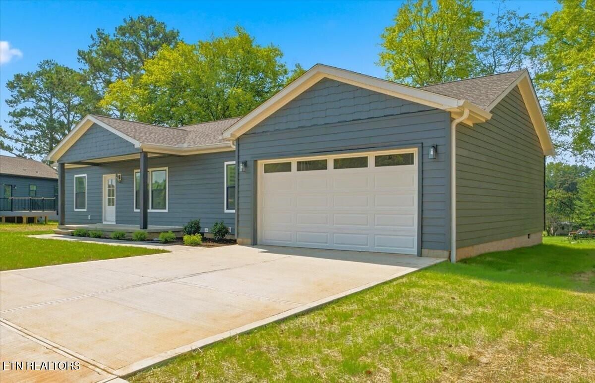 The concrete driveway and walks make coming and going a worry free experience.