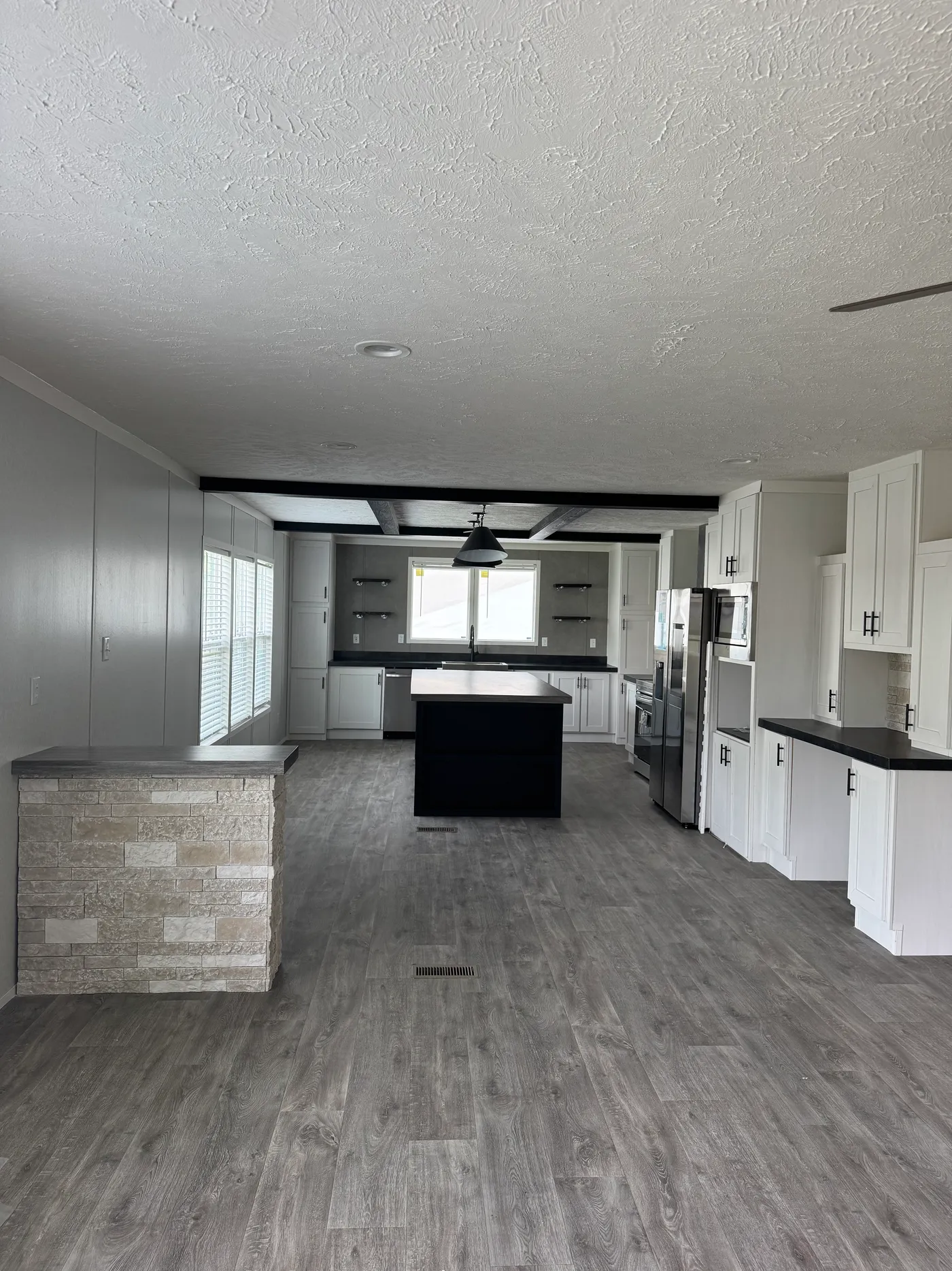 Living room view to kitchen
