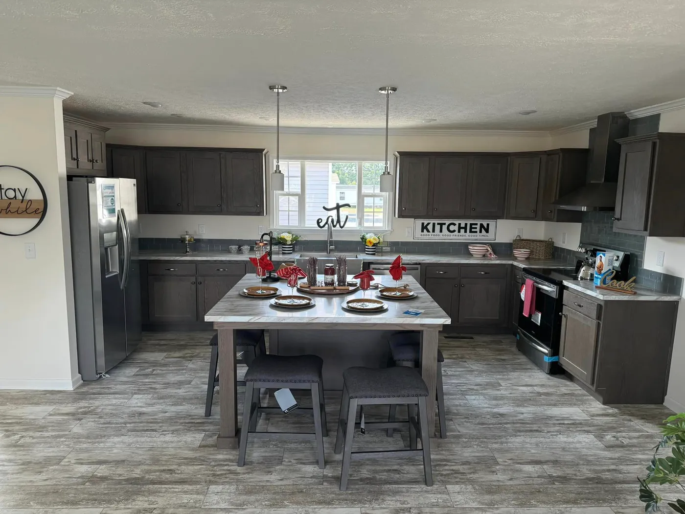 Island/dining area with modern appliances 