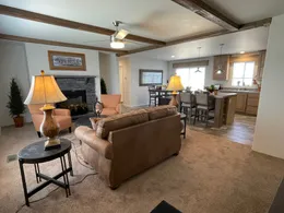 Spacious family area with barnwood beams.
