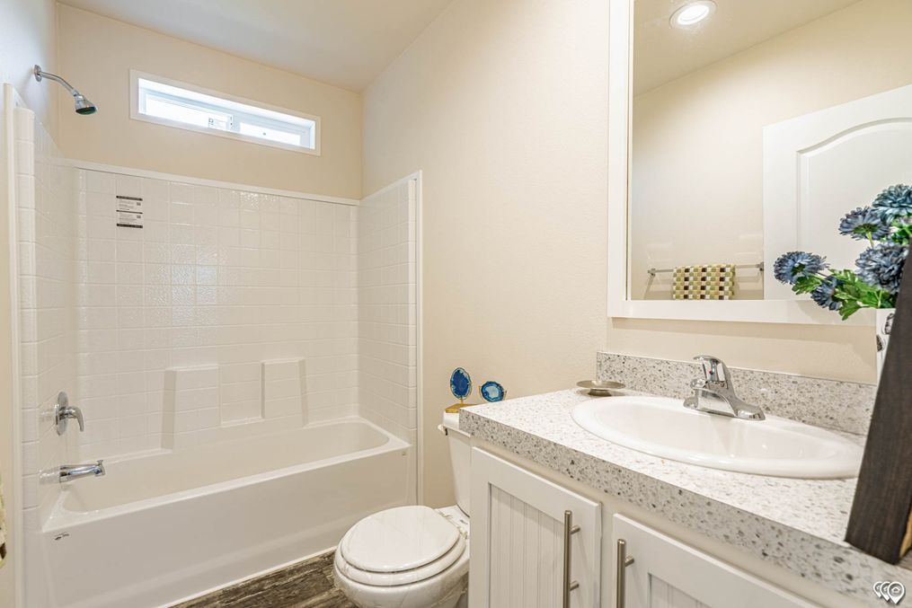 Extra large guest bathroom.