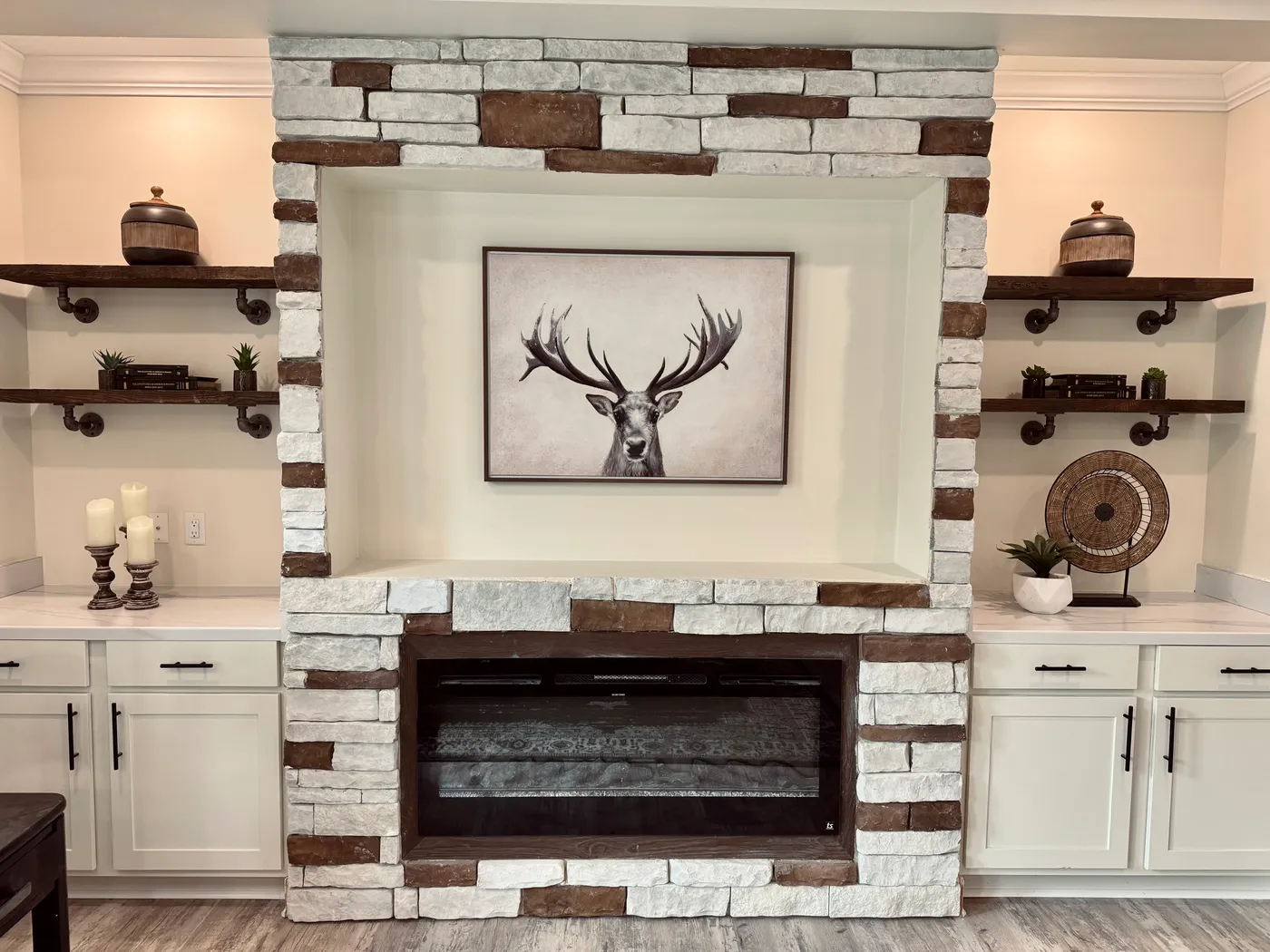 Wood burning, gas or electric fireplace options. Additional stone work and built in cabinetry.  (Electric shown)