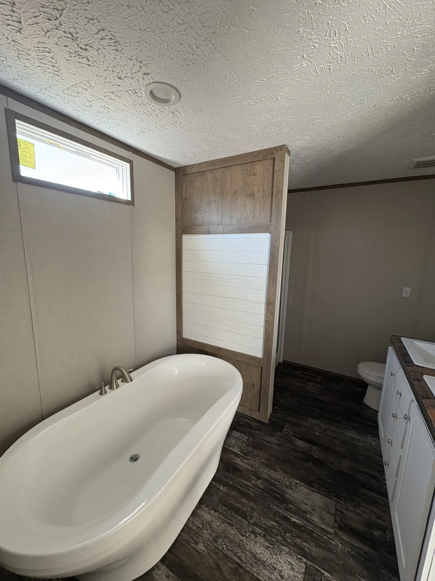 Primary Bathroom Separate Tub and Shower.
