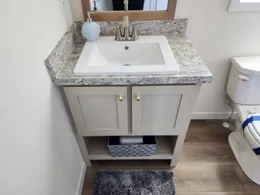 Cute bathroom with single sink