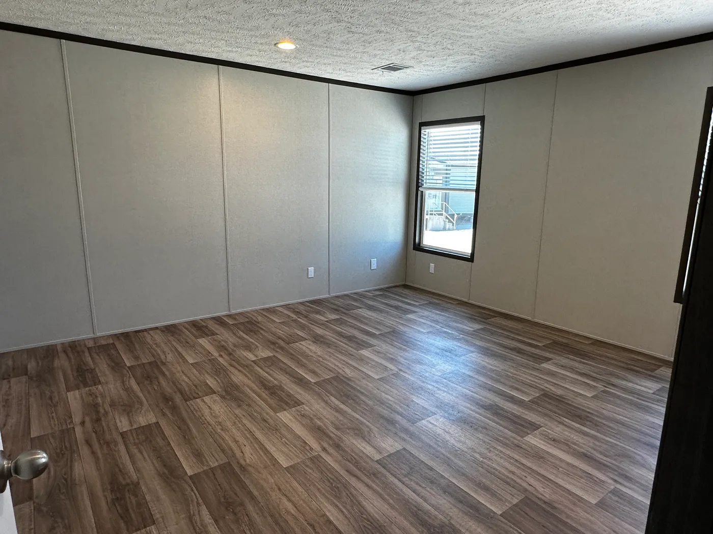 extra wide doublewide mobile home, 32x52 manufactured home, SmartPanel siding mobile home, open floorplan manufactured home, energy-efficient doublewide, walk-in shower mobile home, walk-in closet master bedroom, spacious manufactured home for sale.
