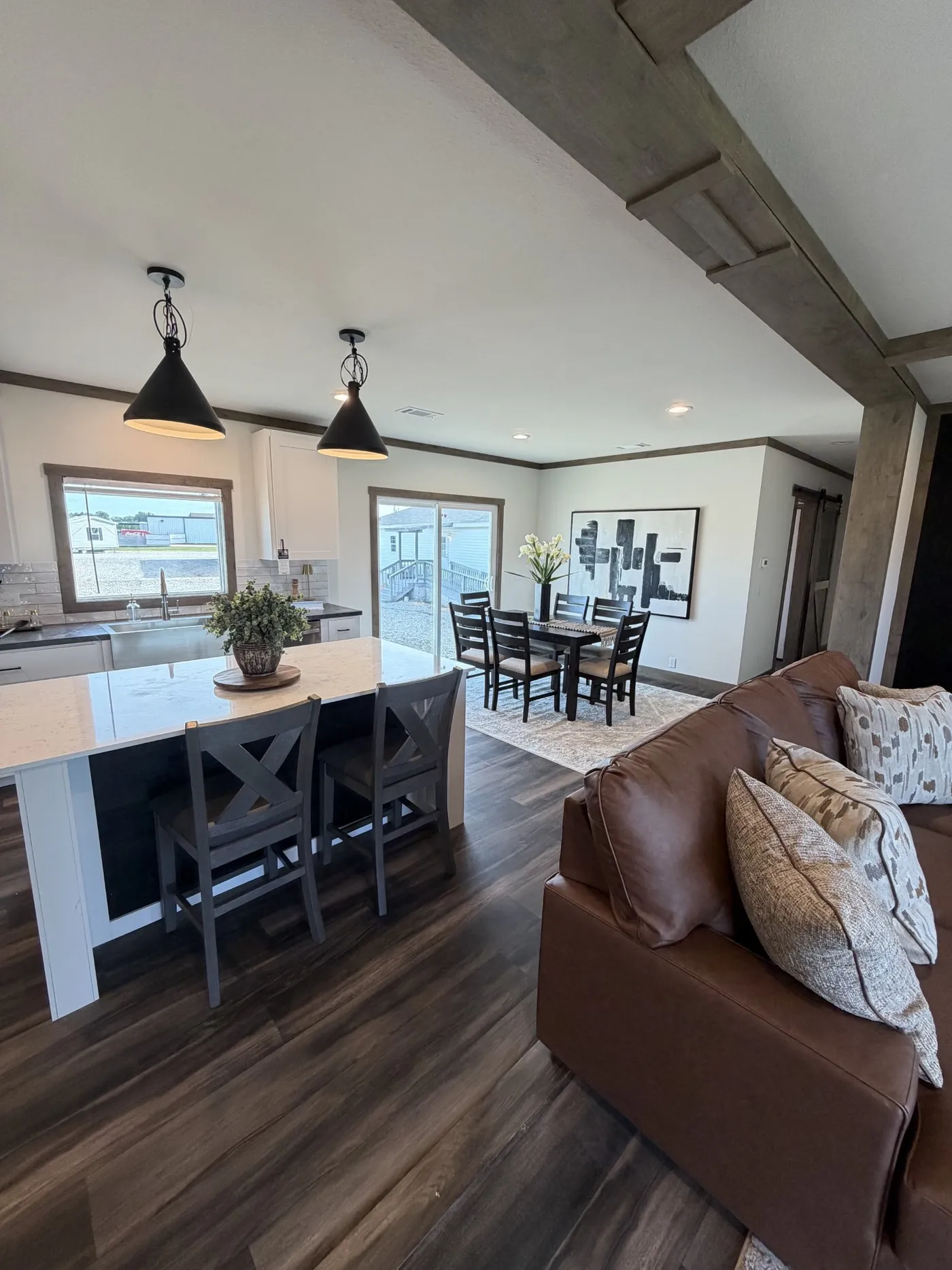 Gorgeous kitchen and dining area with patio doors to build that beautiful deck off the back adding that extra space needed for all your families get togethers