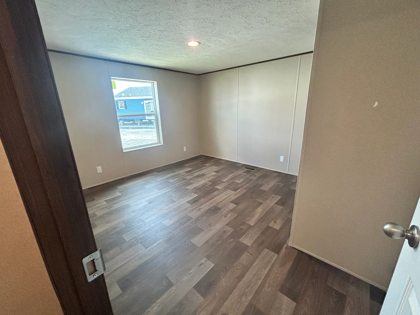 Another look into one of the four guest bedrooms in this home. 