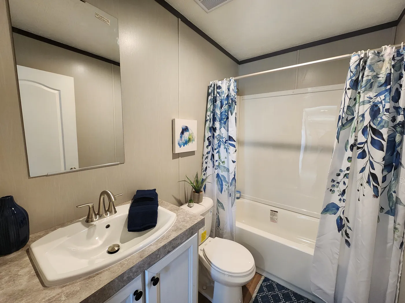 Porcelain sink, and standard tub shower combo 