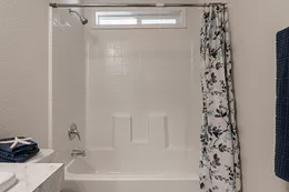 Window over guest bath tub for light and fresh air