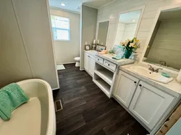 Double Vanity.  Tile shower.  Stand up tub.