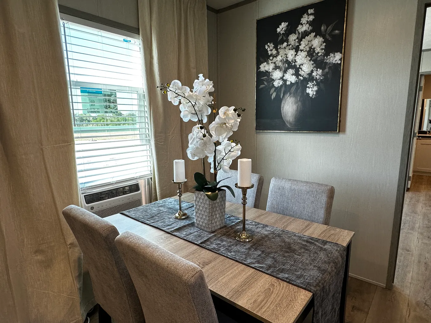 Affordable luxury meets modern comfort in this 3 bedroom, 2 bathroom manufactured home designed for spacious living and energy efficiency. The open-concept layout features a stylish kitchen with stainless steel appliances and a large walk-in pantry for extra storage. The private primary suite includes a generous walk-in closet and a relaxing retreat feel. Enjoy improved comfort with ceiling air vents for better airflow and temperature control throughout the home. This energy-efficient home offer