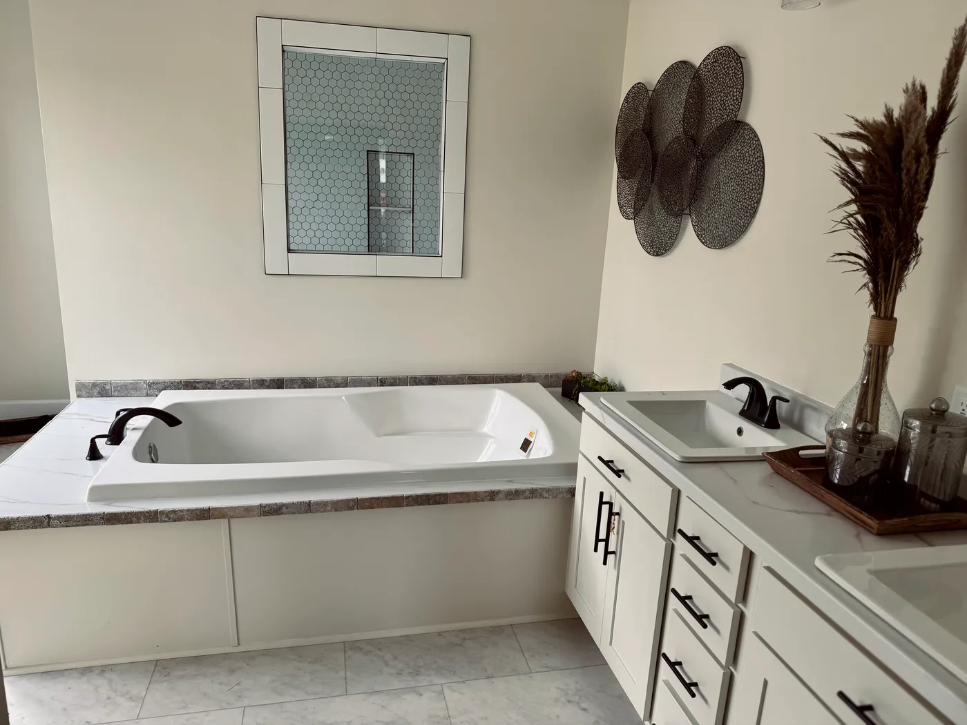 Tub and shower. Double vanities.