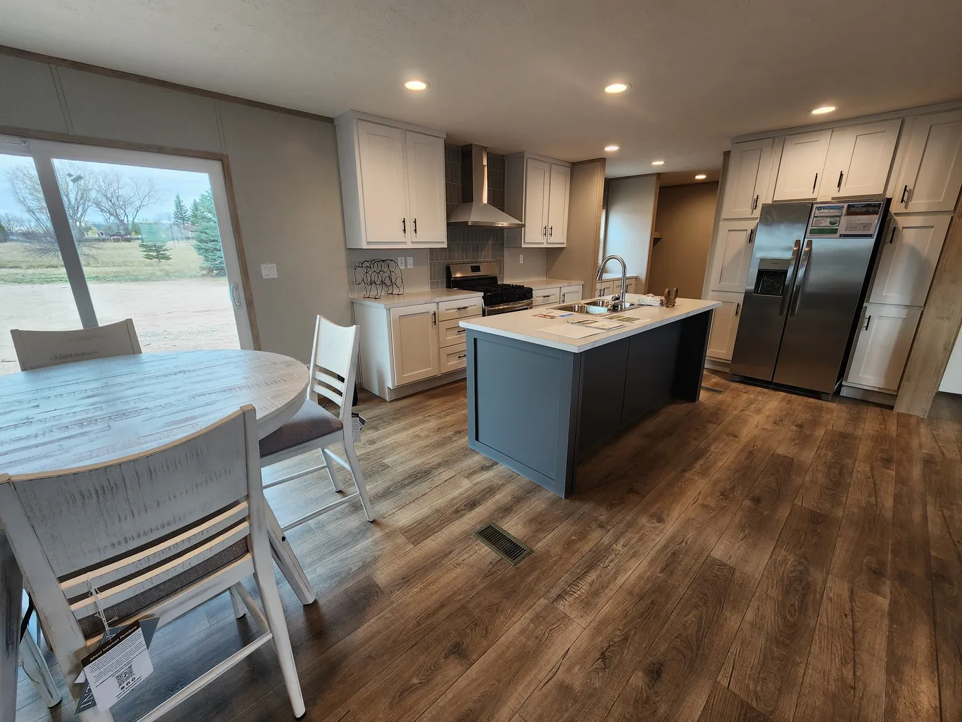 Dining room and kitchen with a large island