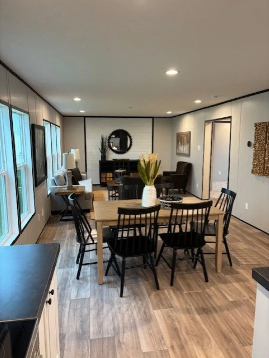 Open floor plan. View from kitchen to den.
