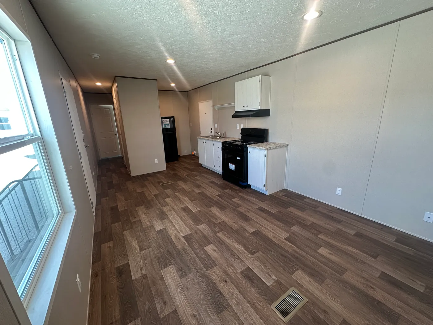 Looking for an affordable tiny mobile home, hunting lodge, vacation getaway, guest house, or mother-in-law suite? This 432 sq. ft. one bedroom, one bath tiny home is the perfect compact living solution. Designed for simple, efficient living, this small manufactured home offers everything you need in a smart, budget-friendly floor plan. Whether you need a weekend cabin for hunting land, a private vacation home, extra space for family, or an affordable full-time home, this tiny mobile home deliver