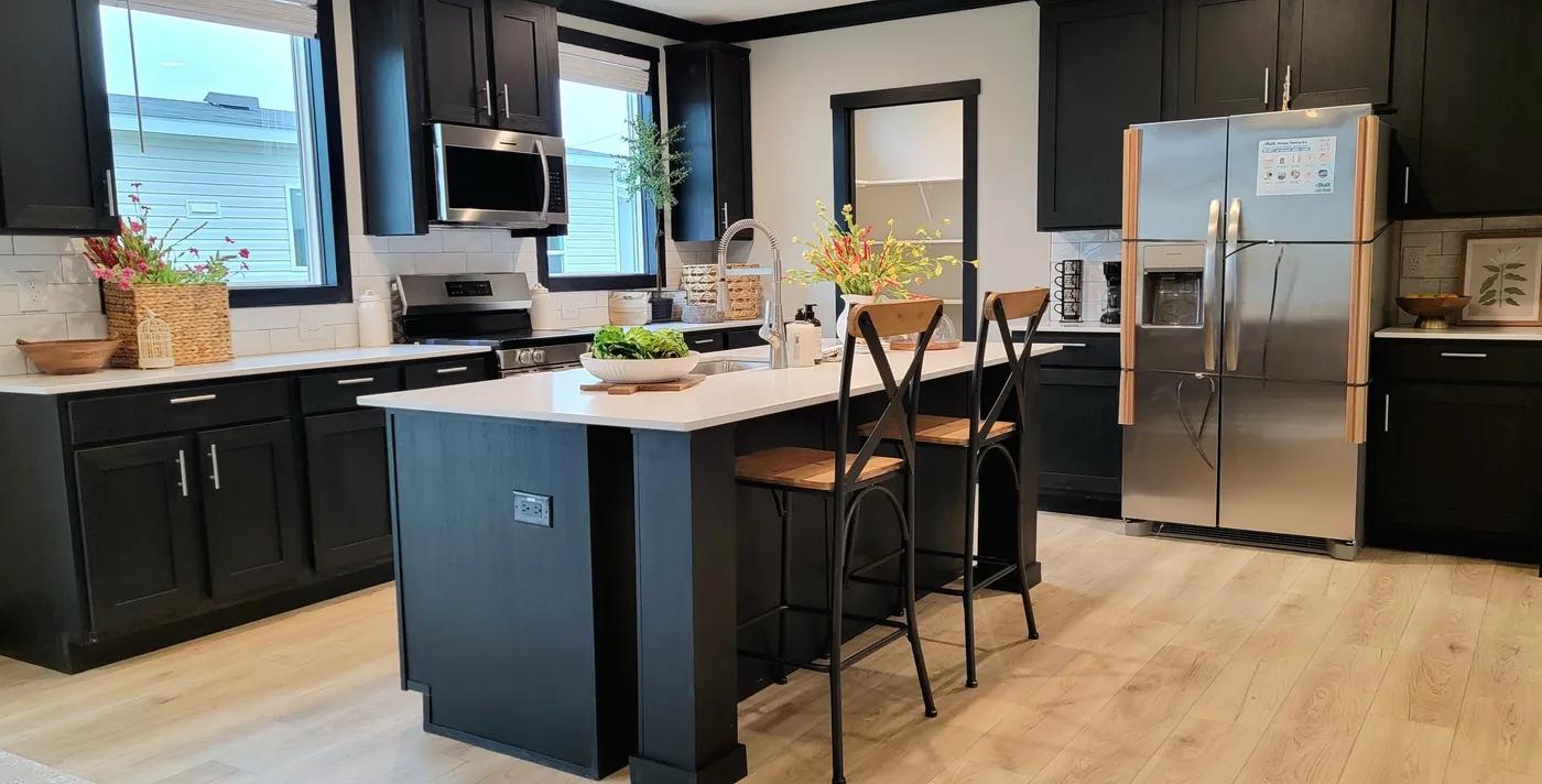 Solid surface kitchen counter top. Dura Craft cabinets.