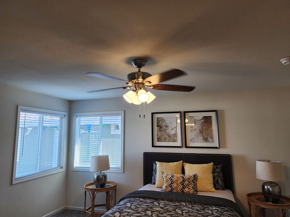 Ceiling fan in primary bedroom
