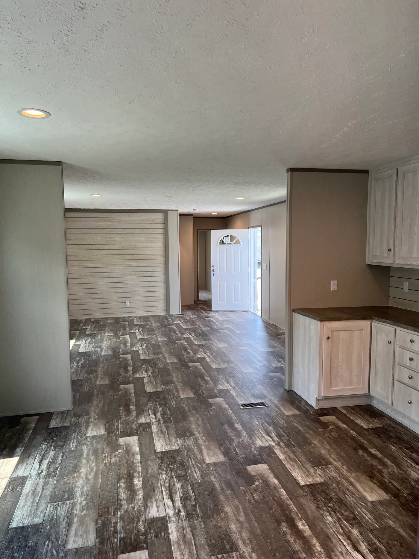 Family room very roomy with lots of natural lighting.