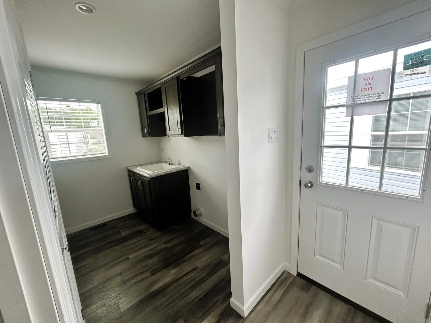 The side entry/exit, with a look into the utility room.  