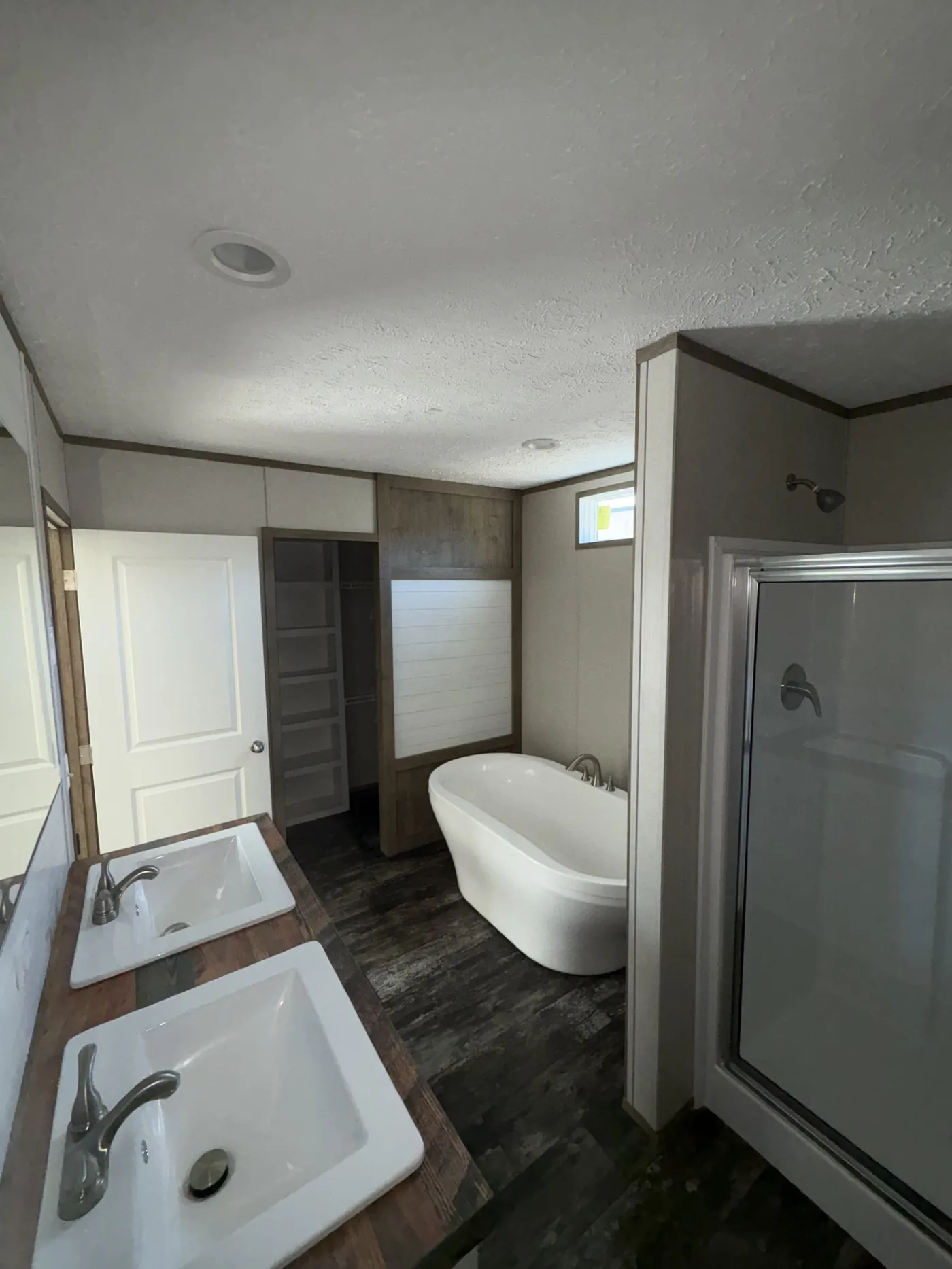 Primary Bathroom Separate Tub and Shower.