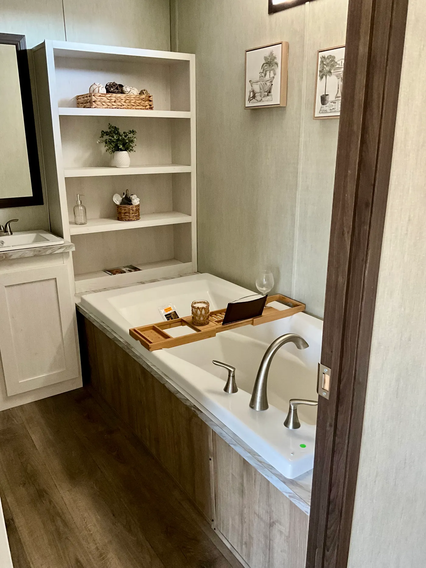 View of Primary Bathtub/Storage Shelving