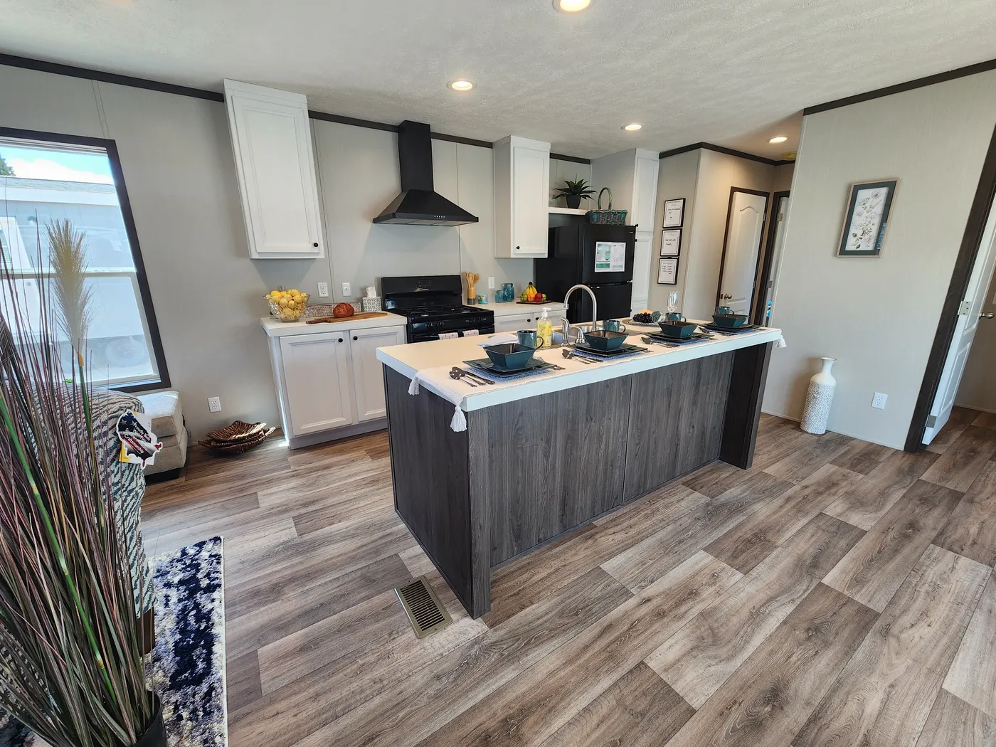 Open concept dining area and kitchen with an island that you can use as a breakfast bar.