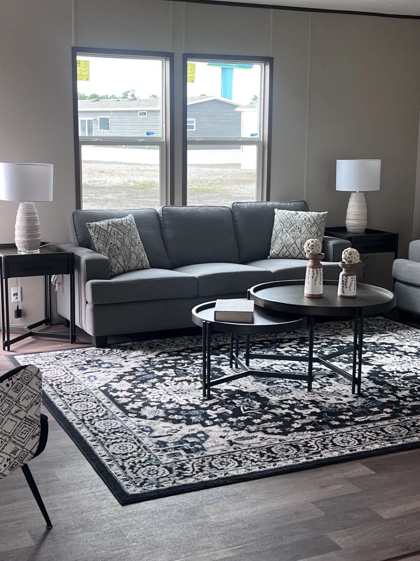 A bright, openLivingroom is filled with Natural light, offering a perfect space for both relaxation and entertaining