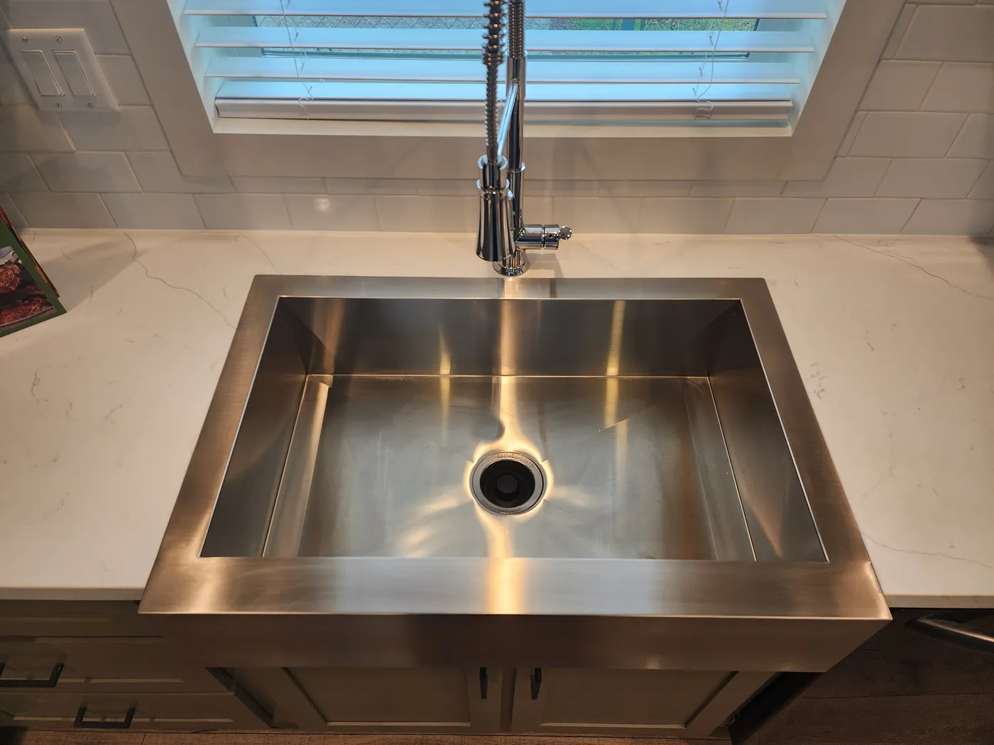 Stainless sink with gooseneck faucet