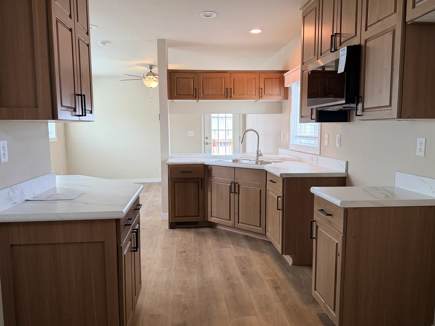 spacious kitchen with many cabinets