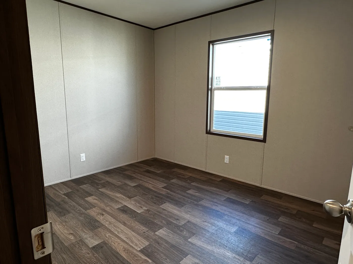 Discover the best value in affordable housing with this spacious 3 bedroom, 2 bath manufactured home, one of the largest and most affordable floor plans available. Designed for comfort and functionality, this energy-efficient mobile home features a large open layout, spacious bedrooms, and modern living areas perfect for families. The kitchen comes fully equipped with a refrigerator, stove, and dishwasher, making move-in easy and convenient. Built for efficiency and long-term savings, this home 