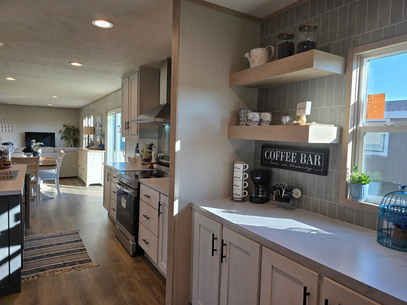 STOCK PHOTO - home for sale is same colors and does include appliances as shown but does not include furniture or decor.