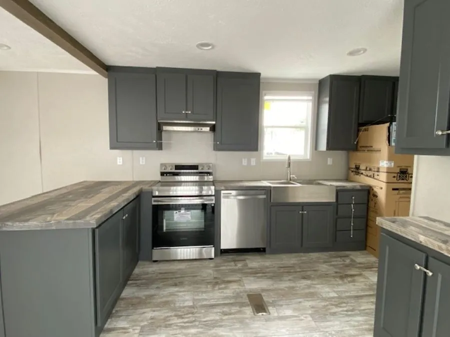 Beautiful kitchen with upgraded cabinets and awesome stainless steel farm sink!