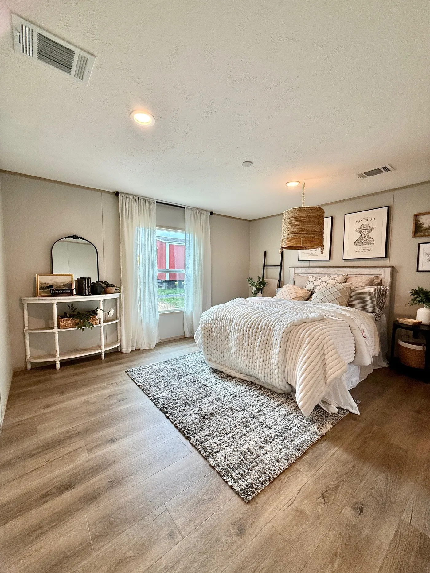 Your private retreat at the end of the day.
This spacious primary bedroom offers plenty of room to relax and unwind. The large windows bring in beautiful natural light, creating a calm and inviting space that feels like your own personal retreat.
With its modern finishes and stylish décor, this bedroom feels like something straight out of a design magazine.