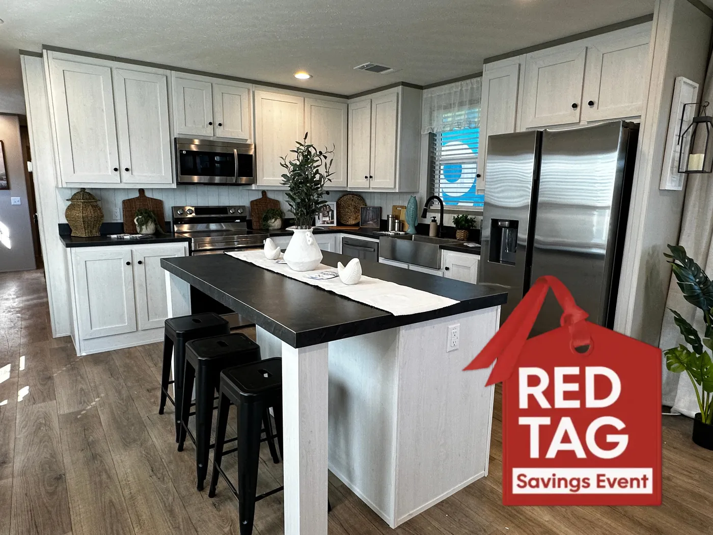 Discover this luxury porch model manufactured home featuring 2 bedrooms, 2 bathrooms, and high-end finishes designed for comfort and style. This modern manufactured home offers an open floor plan, stainless steel appliances, and a huge kitchen island perfect for entertaining. The spacious suite includes a walk-in closet and a large tiled low-profile walk-in shower for a spa-like feel. Built for durability and long-term value, this home features SmartPanel siding with a 50-year warranty, a 25-yea