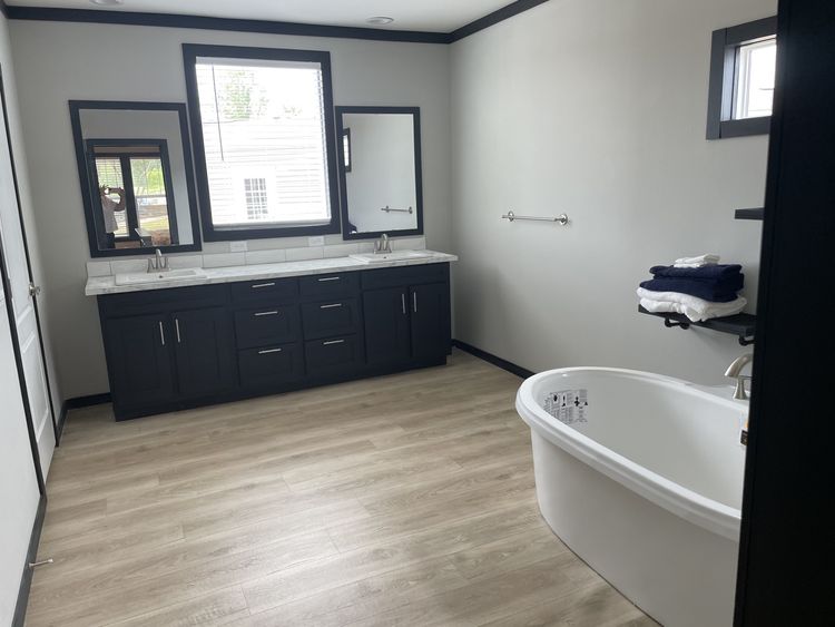 Primary bathroom features large soaker tub, 72" walk in shower, linen closet and enclosed water closet room!