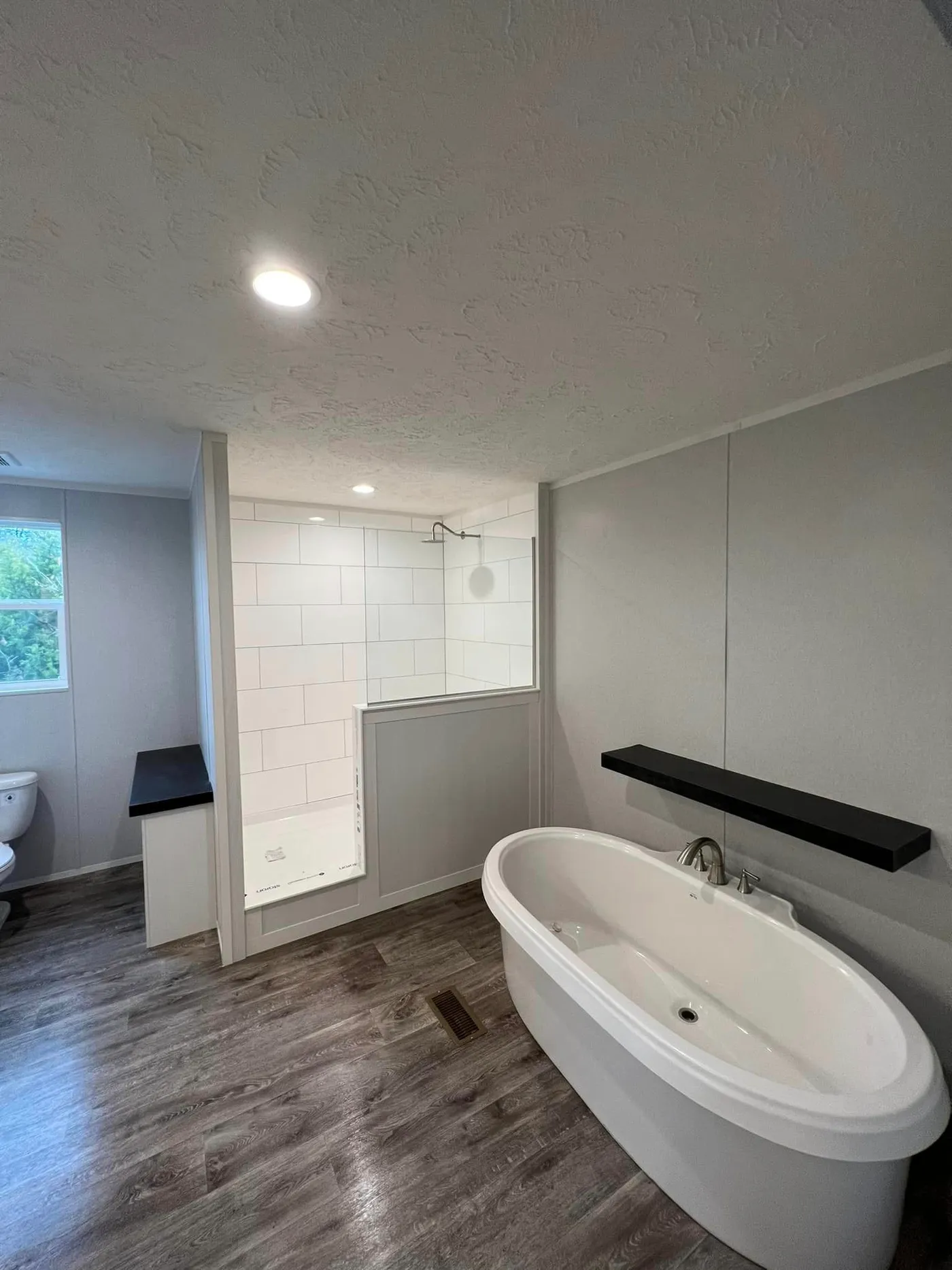 optional 72 inch Tile Shower is available. 