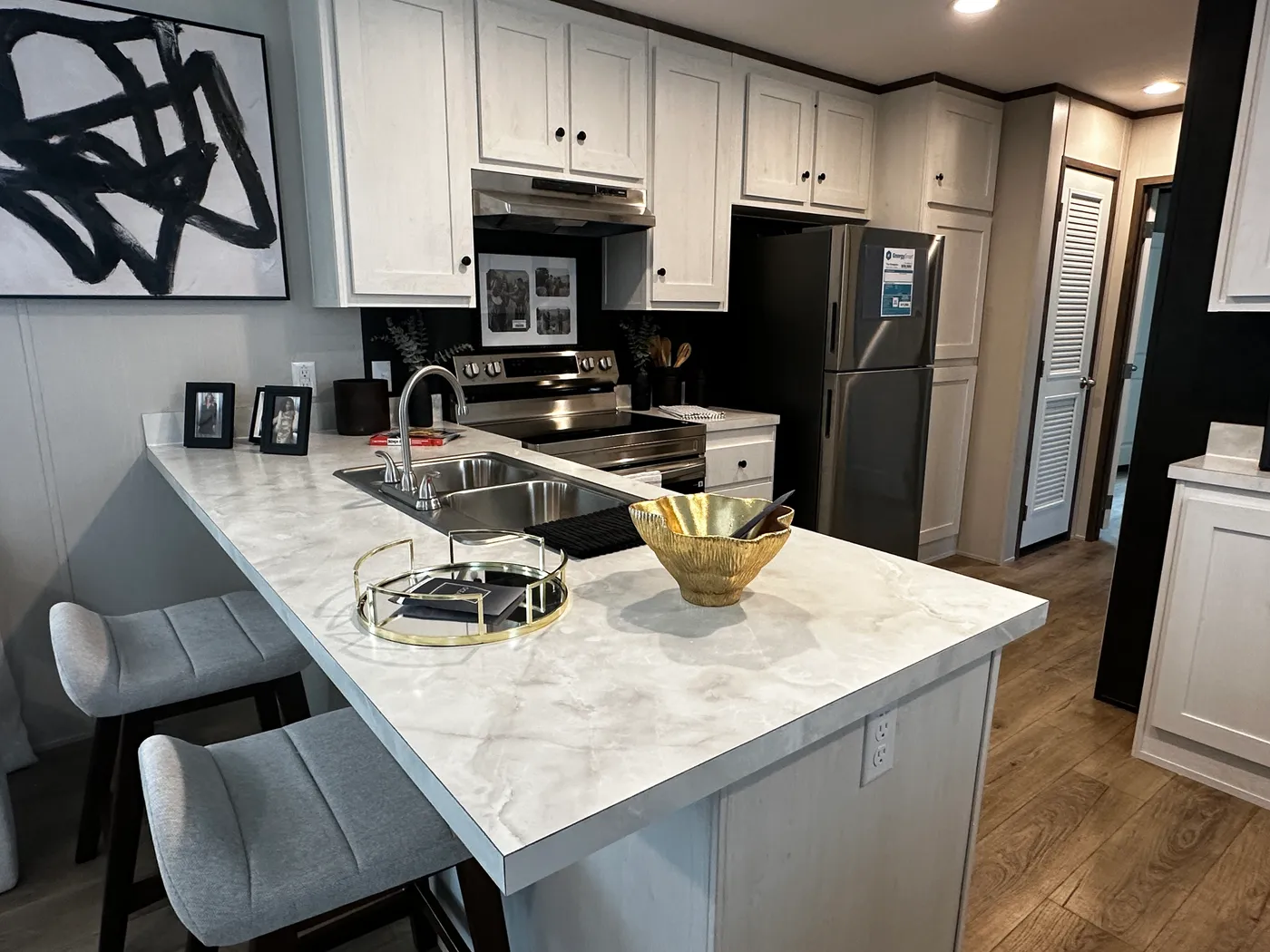 The Bungalow is a budget-friendly 2 bedroom, 2 bathroom manufactured home with approximately 840 square feet of smart, efficient living space. This home is a great fit for first-time home buyers, downsizers, landowners, or anyone looking for a simple and affordable path to homeownership.

With its practical layout and smaller footprint, The Bungalow helps keep things comfortable, manageable, and cost-conscious without sacrificing the essentials of a brand-new home. Visit Clayton Homes of Alvin