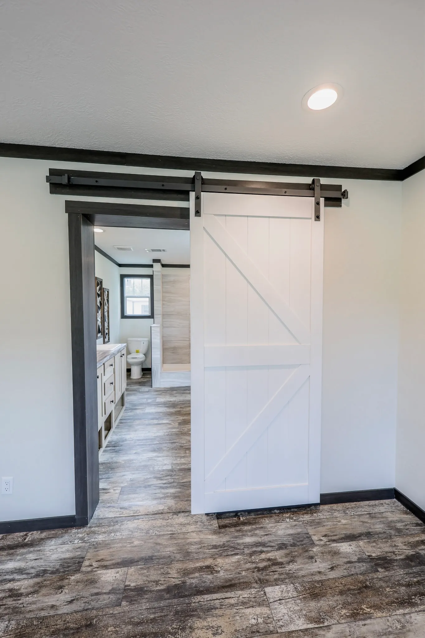 primary bathroom from primary bedroom