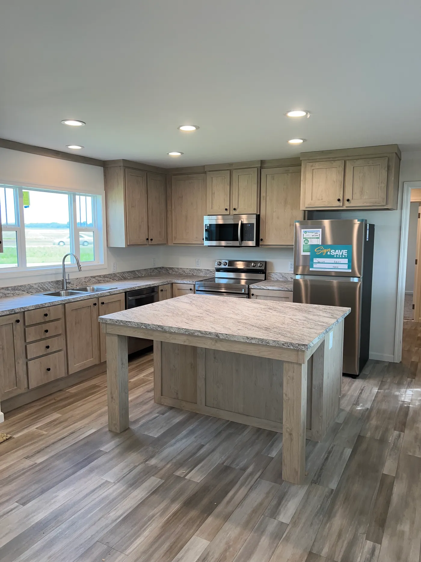 Wonderful kitchen with tons of space and natural light and great built in eat in island. 
