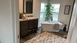 Full size soaking tub and walk in shower.