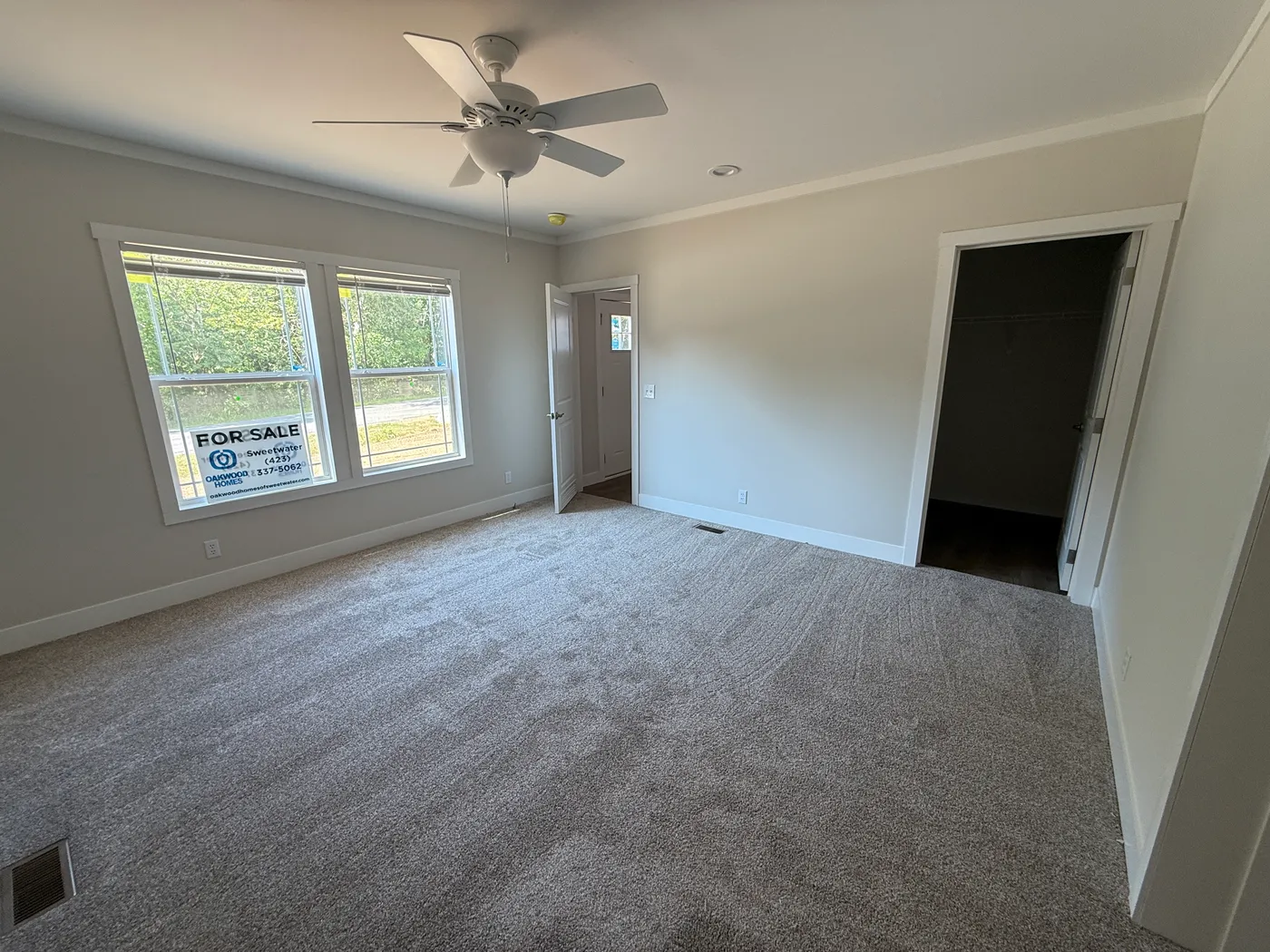 Primary bedroom with walk in closet.