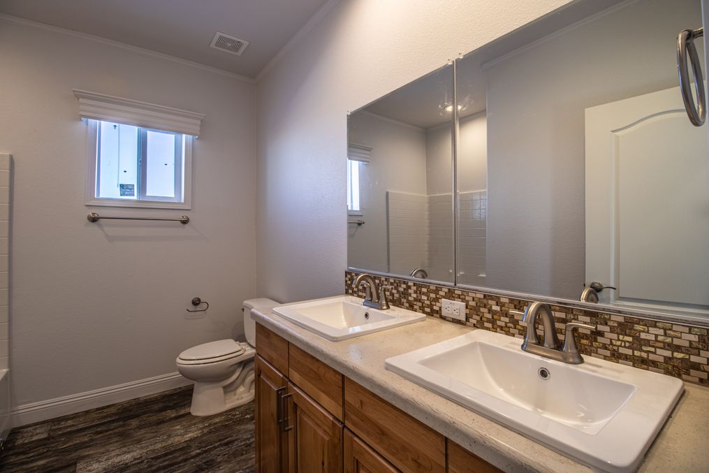 Guest bath with double sinks. 