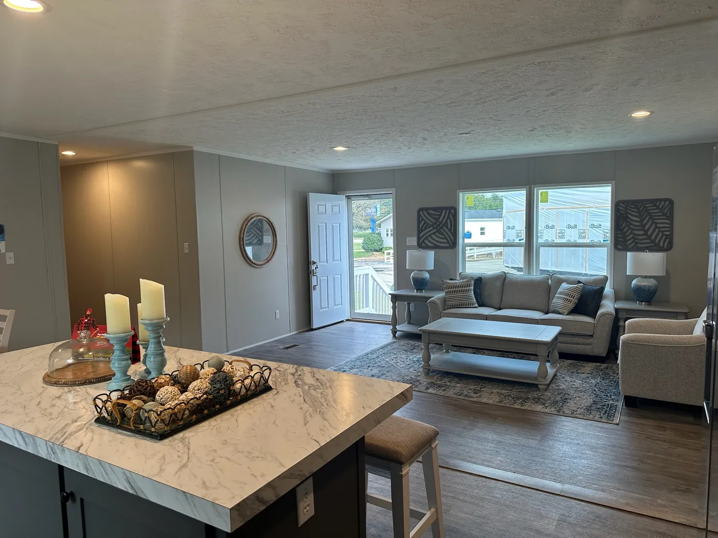 A view from the kitchen shows an inviting space to welcome family and friends-